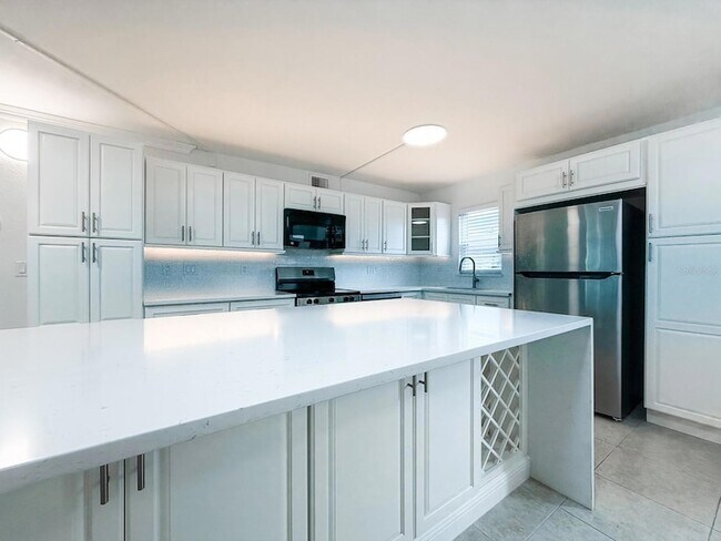 Photo - 7625 Sun Island Drive S Unit 101 Apartment