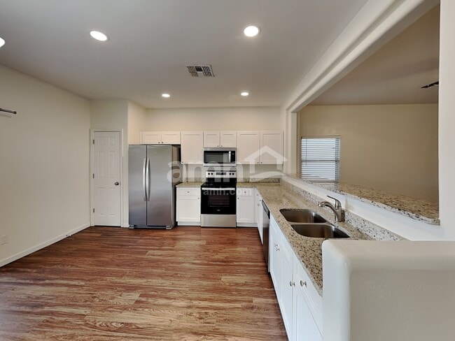 Building Photo - 15355 W Port Au Prince Ln