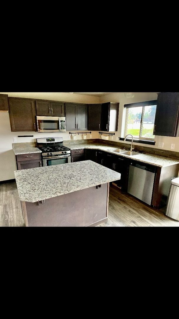 Building Photo - Modern Comfort in the Heart of Coeur d’Alene!