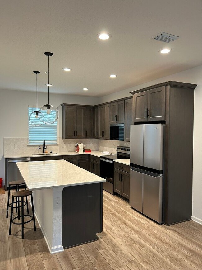 Building Photo - Brand-New Smart Townhome | Resort-Style Am...