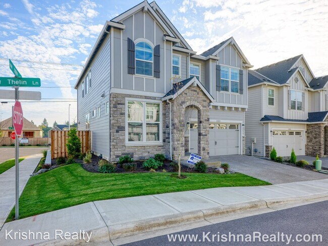 Foto del edificio - 4 br, 3 bath House - 11822 NW Thelin Ln
