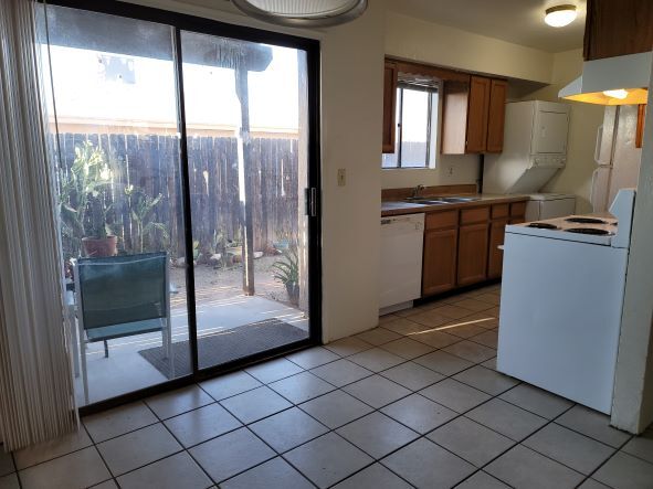 Viewing back patio and kitchen from Dining area - 2841 N Euclid Ave