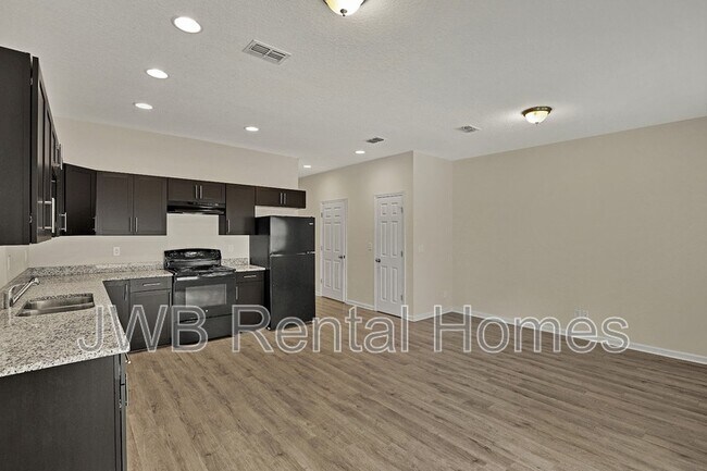 Foto del edificio - 6028 Carolines Ct