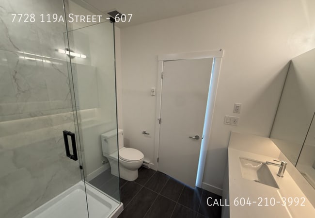 Building Photo - Beautiful Top Floor Corner Condo