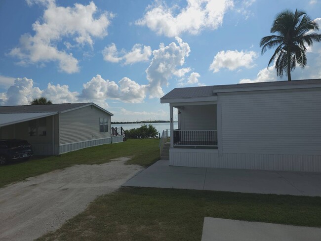 Building Photo - 200 S Banana River Dr