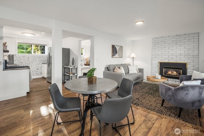 living room with gas fireplace - 12710 89th Pl NE