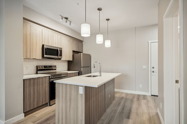 Photo du bâtiment - Discover Your Dream Home at Riverpark Apar...