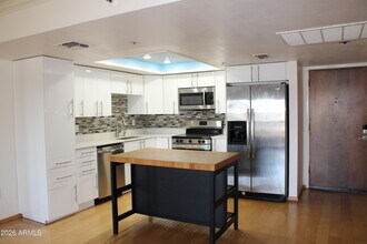 Building Photo - 7950 E Camelback Rd
