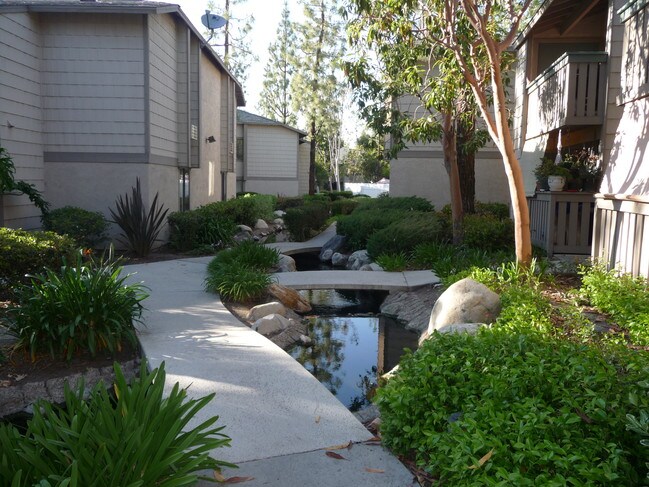 Beautiful landscaping with creek - 20702 El Toro Rd