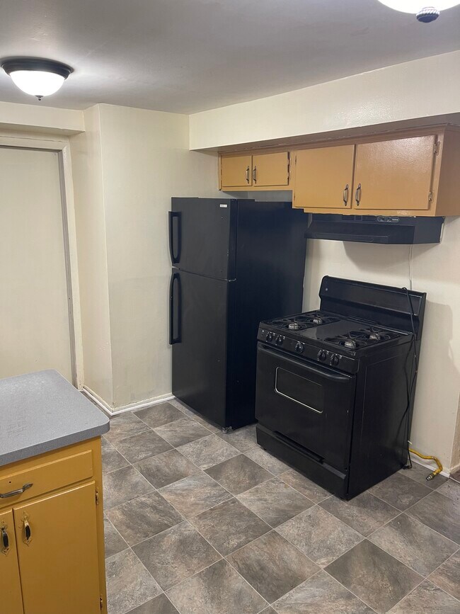 Kitchen with Stove & Refrigerator - 26136 Carlysle St