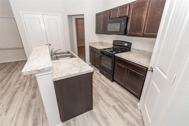 Building Photo - 8626 Lafferty Oaks St