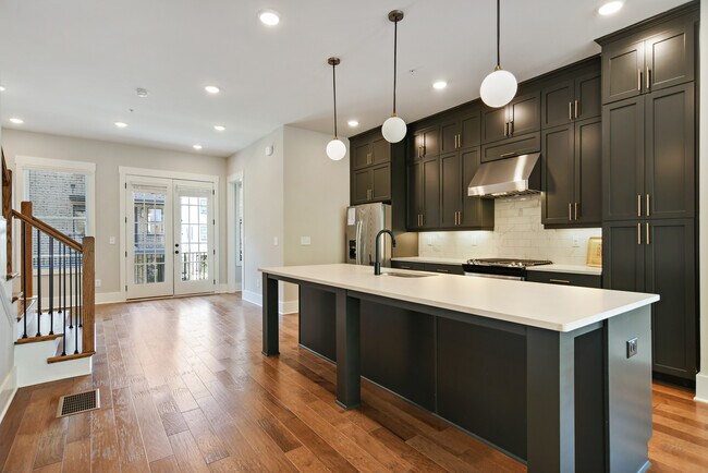 Stone countertops with gas appliances and soft close cabinets - 1029 Donald Lee Hollowell Pky NW