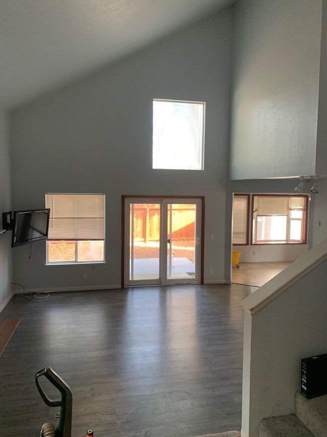 Floors replaced with life proof semi water proof, living room was painted first then floors to match - 1638 Schooner Ct