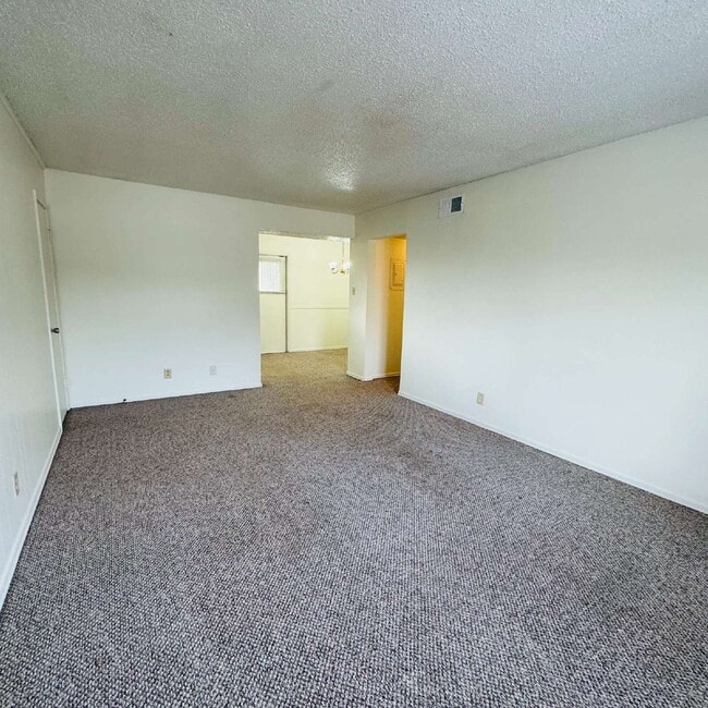 Building Photo - Inviting Townhome at Maison Helena Townhomes in Nederland, TX