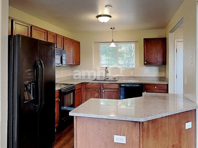 Foto del edificio - 1393 E 96th Pl