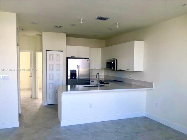 Building Photo - 6455 NW 103rd Pl