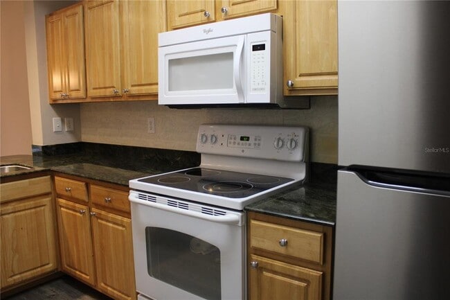 Building Photo - 5711 Bentgrass Dr