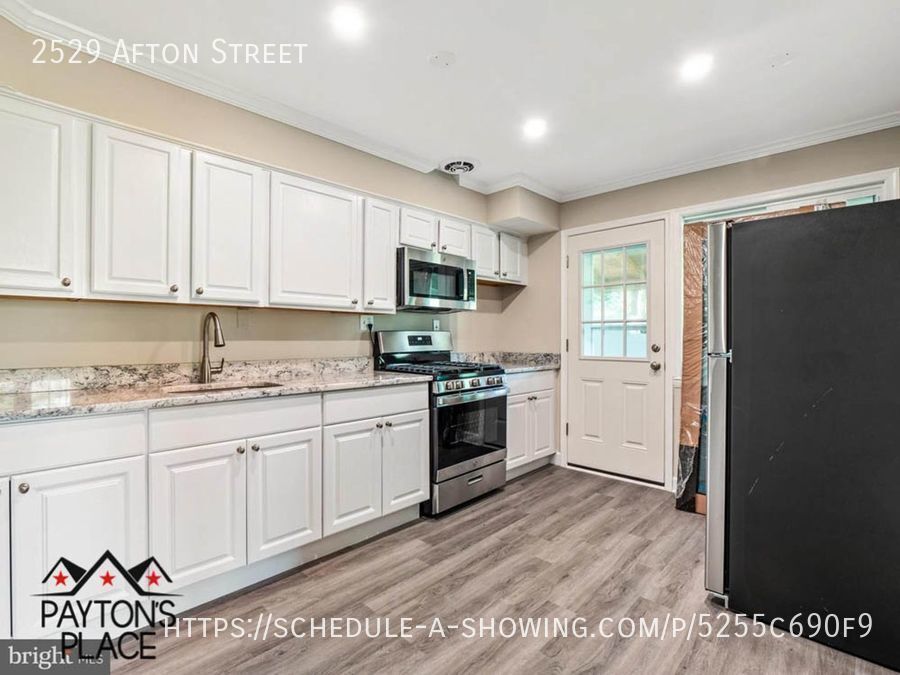 Primary Photo - Beautifully Renovated Home with tons of Ou...