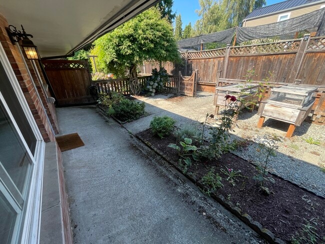 Unit exterior and private yard - 7327 38th Ave NE