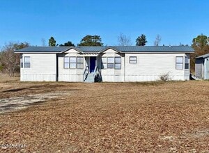 Building Photo - 6801 Adams Rd