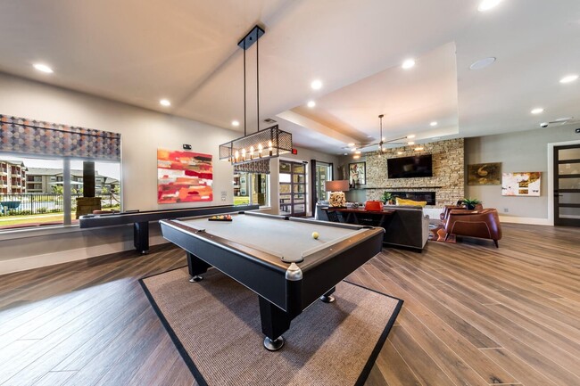 Pool Table & Shuffleboard Table at Legacy Creekside Apartments, Texas - Legacy Creekside Apartments