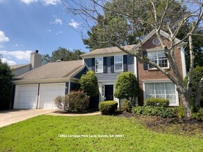 Building Photo - 11865 Carriage Park Ln