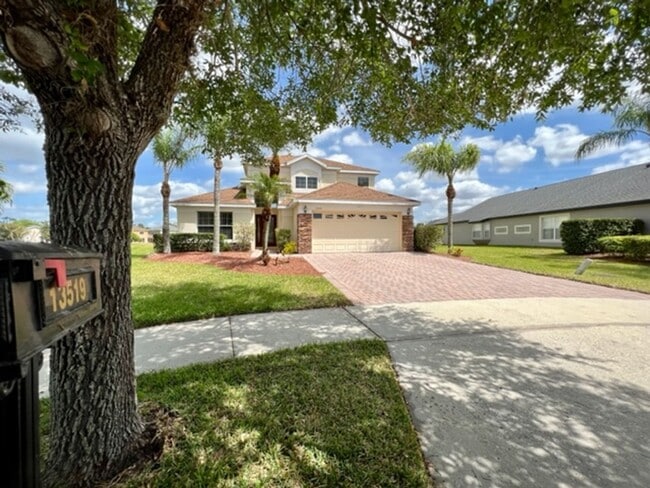 Building Photo - EAGLE CREEK LAKE NONA! WELCOME HOME! Beautiful water views! Spacious 2 story-3 bedroom 2.5 bath h...