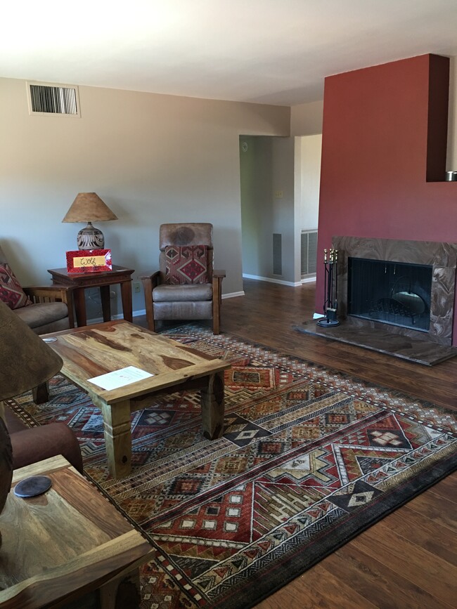 Living room with wood burning fireplace - 2927 Mesa Rd