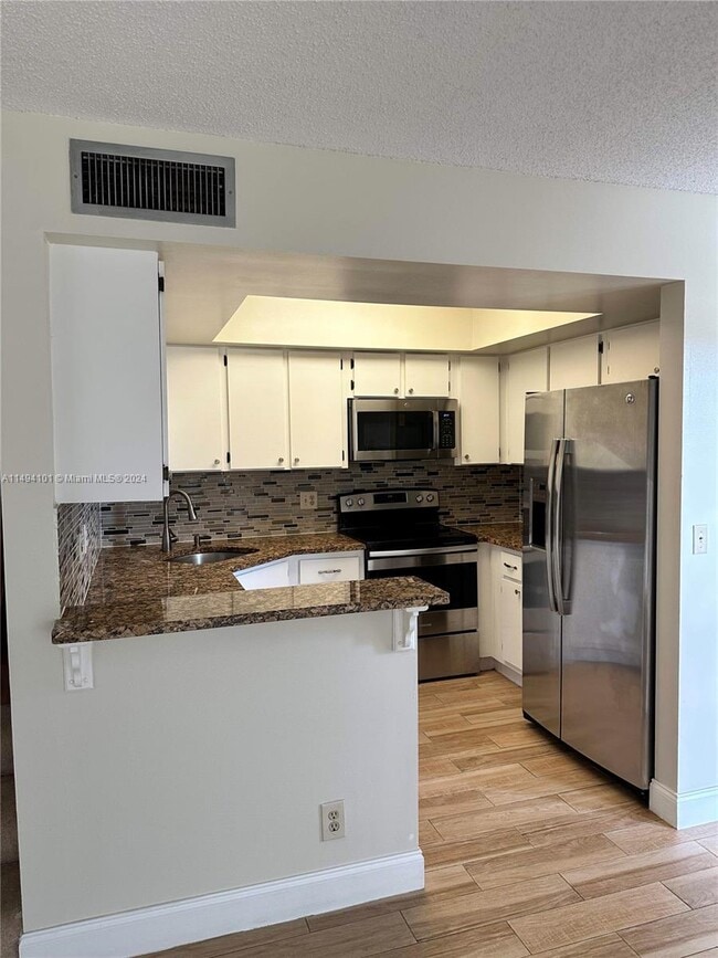 Building Photo - 3690 Village Dr