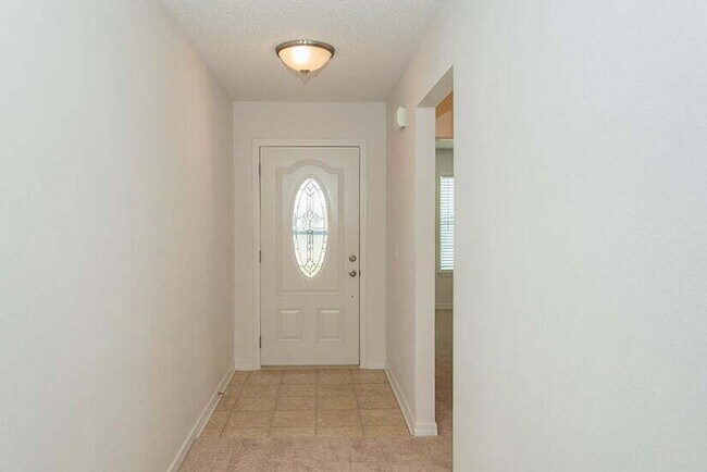 Building Photo - "Coastal Comfort Awaits: Charming 3-Bed, 2...