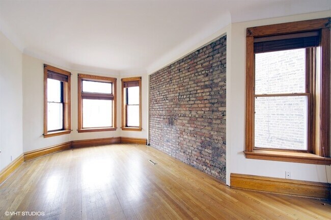 Building Photo - 1243 W Newport Ave
