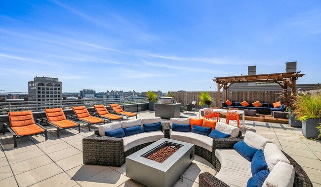 Connect, relax, and play on our stylish rooftop terrace - One Greenway