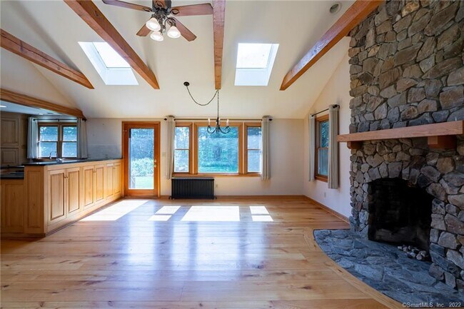 Field stone fireplace with hearth. - 101 Jackson Ln