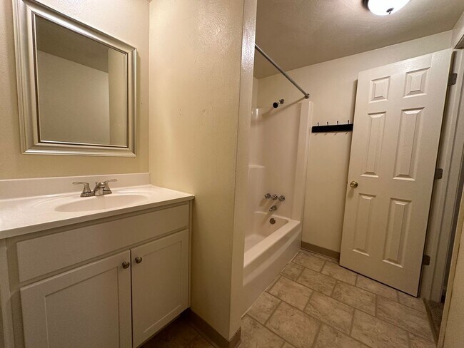 Building Photo - One Bedroom Apartment with Exposed Brick & Off-Street Parking! Tour this Stunning One Bedroom Today!
