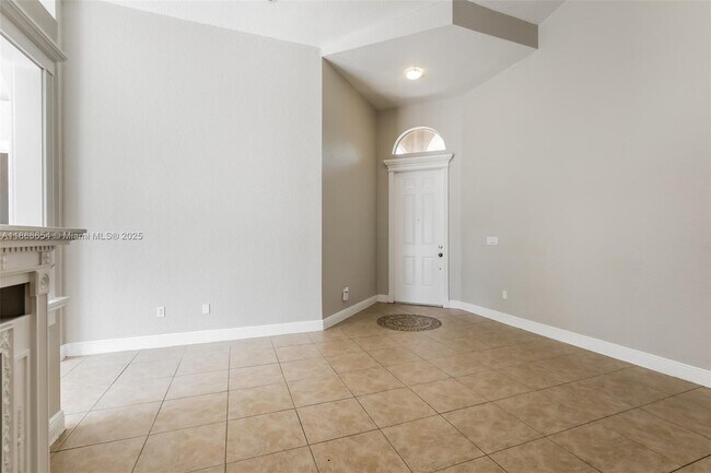 Building Photo - 1695 NE 37th Pl
