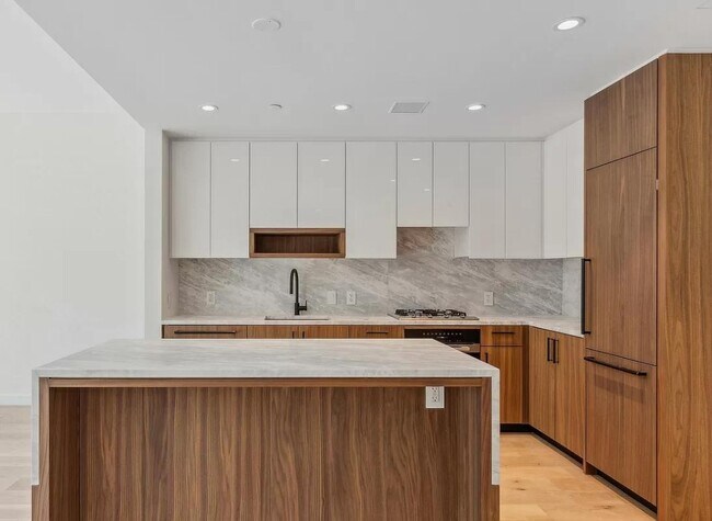 Building Photo - Proper Design. Smartly Priced. Ready for M...