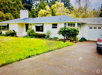 Building Photo - 1702 SE Oak Shore Ln