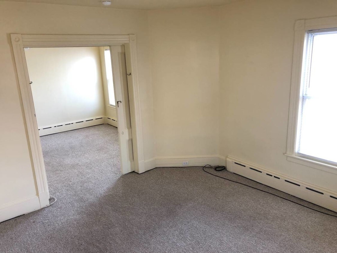 One Bedroom features high ceilings - 224 E Main St