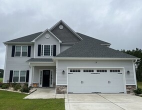 Building Photo - 931 Farmyard Garden Dr