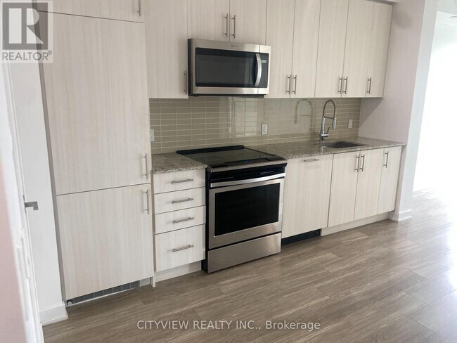 Photo du bâtiment - 4085-4085 Parkside Village Dr