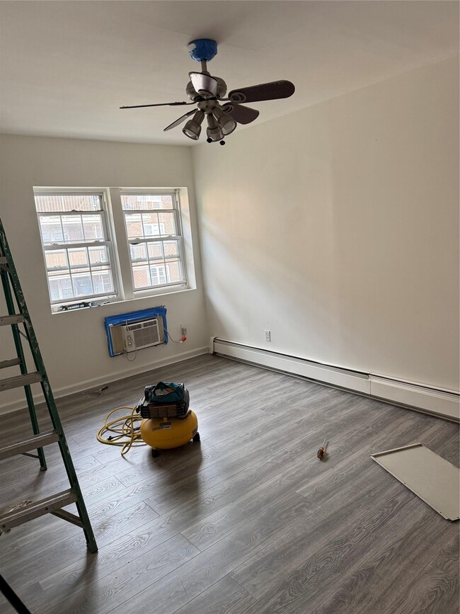 Building Photo - 47-57 58th Ln