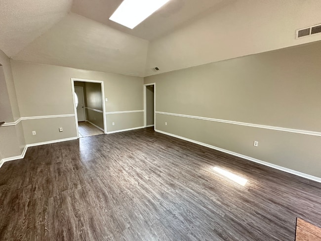 Photo - Charming 3BR/2BA Near Southwind | Soaring Vaulted Ceilings, Rustic Fireplace & Garage House