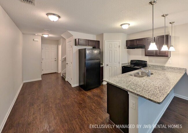 Foto del edificio - 8407 McGirts Village Ln