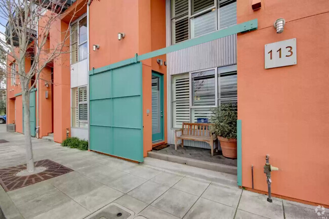 Front entrance with sliding gate. - 113 F St