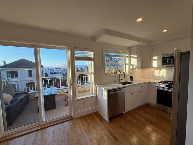 Remodeled Kitchen with View of City - 119 Peralta Ave