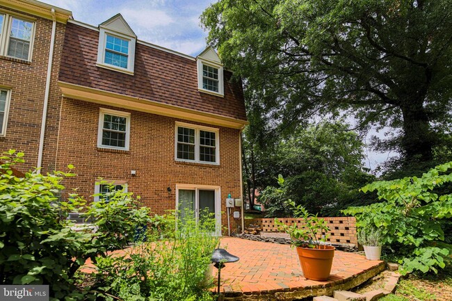 Patio with raised beds to fulfill both your passion for gardening and entertaining. - 8201 Doctor Craik Ct