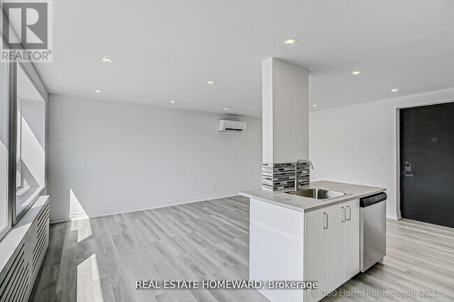 Photo du bâtiment - 419-419 Woodbine Ave