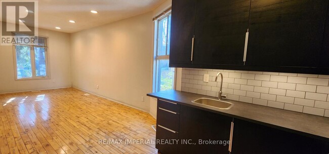 Building Photo - MAIN - 157 BOOTH Ave