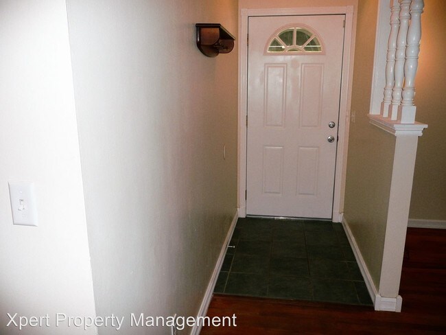 Foto del edificio - 3 br, 1.5 bath House - 319 N. Garrison Rd