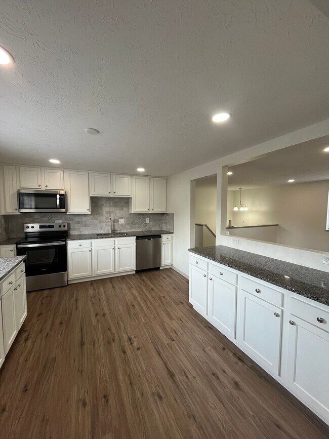 Building Photo - Renovated 5 Bedroom Home-Rare Find